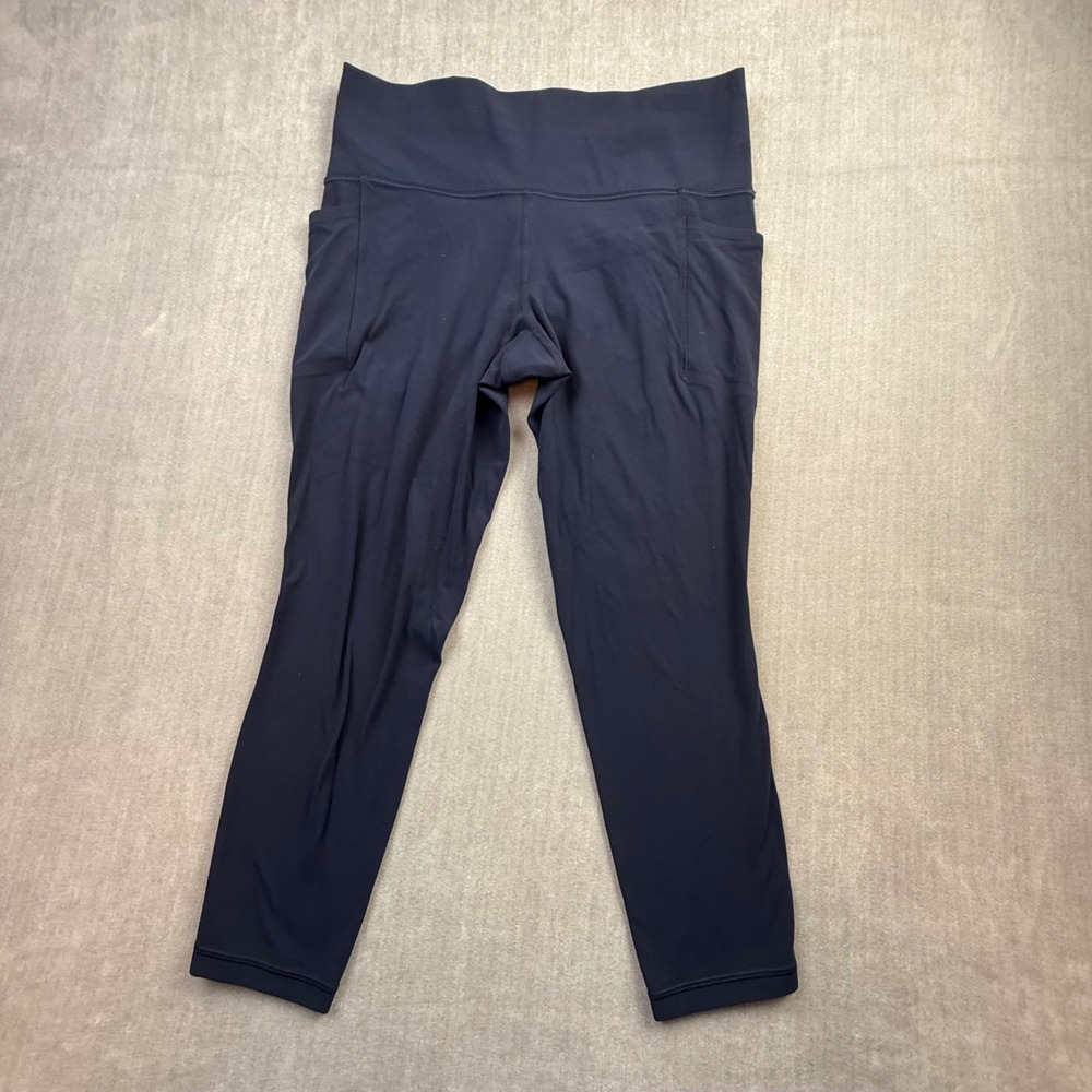 Athleta Salutation Stash 7/8 Tight Leggings Navy Blue Women Large Pockets Yoga
